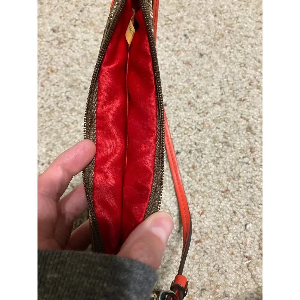 COACH SMALL SIGNATURE PRINT CANVAS, ORANGE TRIM WRISTLET.